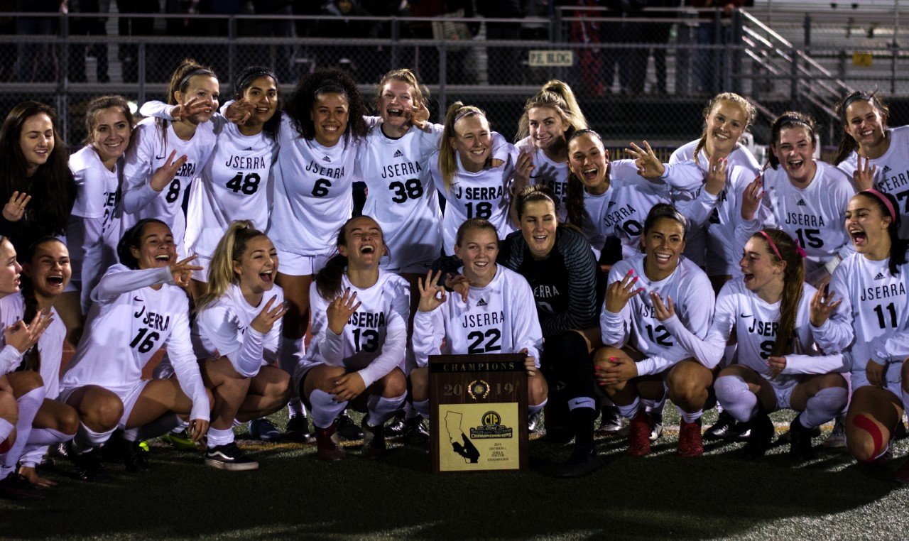 J.Serra players celebrate their third straight CIF-SS soccer title Feb. 23. (J.SERRA HIGH SCHOOL)