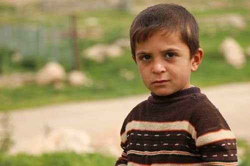 A young child at the Sharia Refugee Camp in Dohuk Iraq. Credit: Daniel Ibanez/CNA.