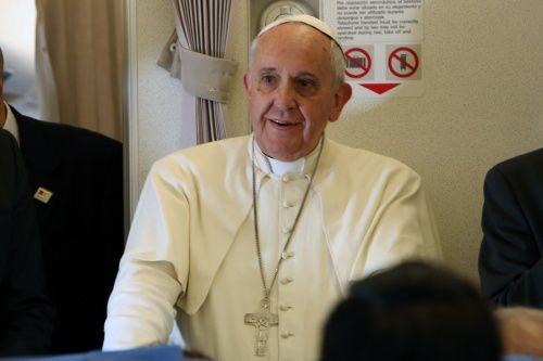 Pope Francis speaks with journalists aboard the plane from Manila to Rome