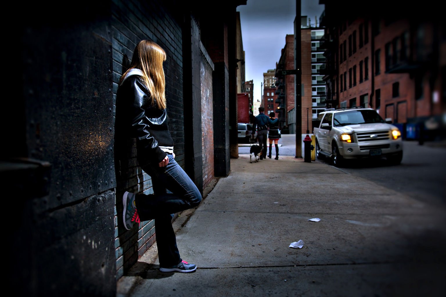 This photo illustration of a young woman depicts the effects of human trafficking. (CNS illustration/Lisa Johnston