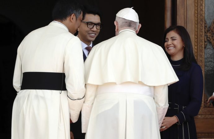Pope Francis is welcomed by Madagascar President Andry Rajoelina