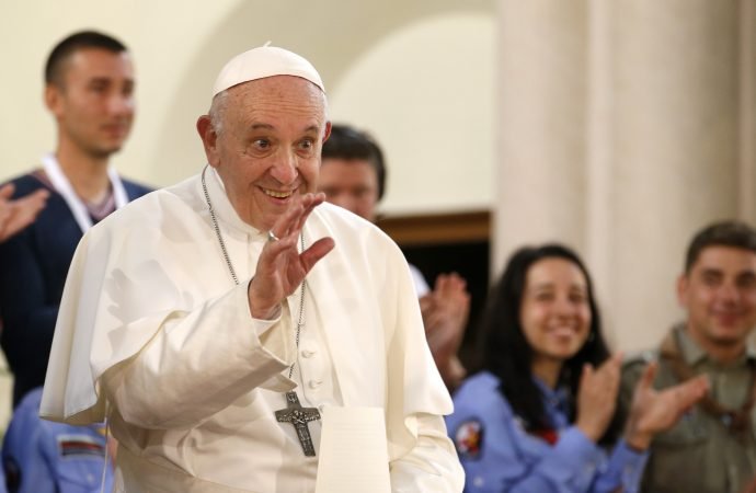 Pope Francis arrives for a meeting with the Catholic community in the Church of St. Michael Archangel