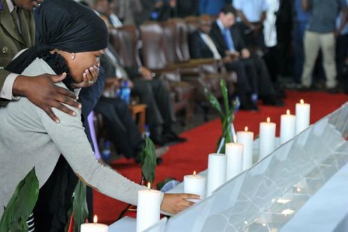 Mourning. Credit: GovernmentZA via Flickr CC BY-ND 2.0.