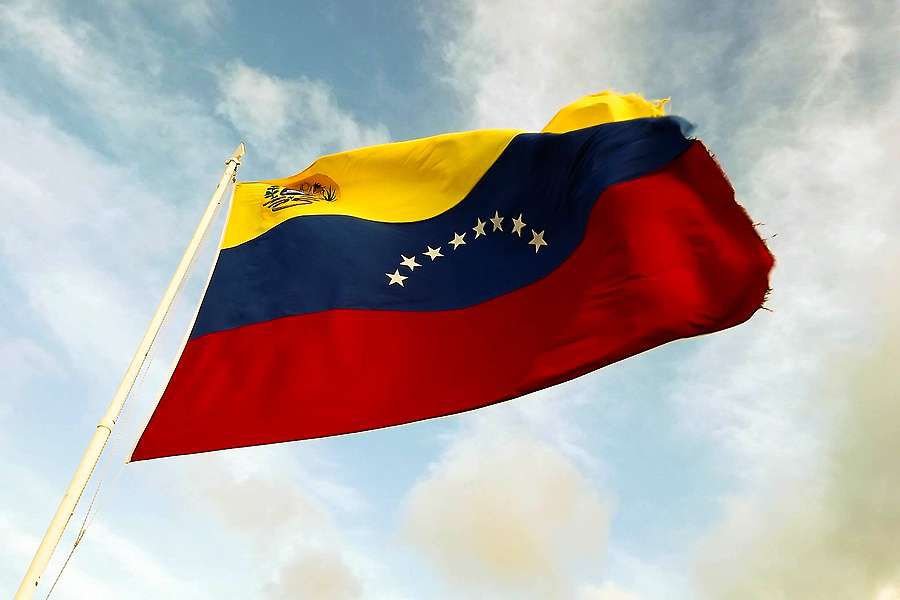 Venezuela Flag. Credit: Anyul Rivas via Flickr (CC BY 2.0).