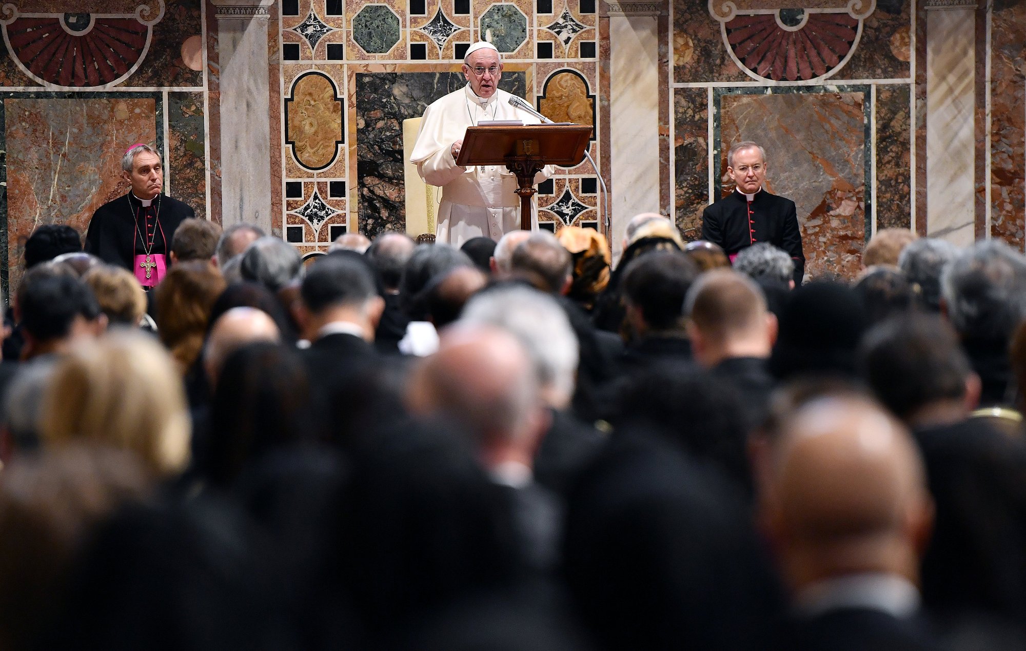 Pope Francis leads an annual meeting to exchange greetings for the new year with diplomats accredited to the Holy See