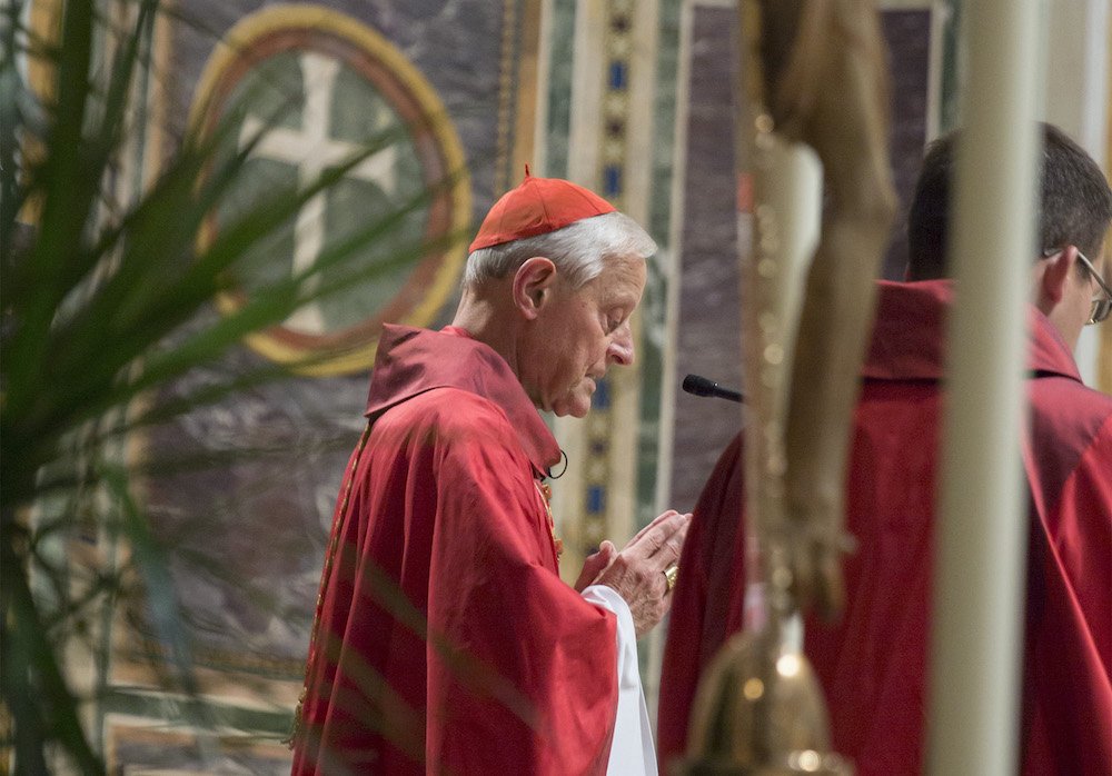 Washington Cardinal Donald W. Wuerl prays during a Sept. 14 Mass at the Cathedral of St. Matthew the Apostle in Washington. (CNS photo/Jaclyn Lippelmann