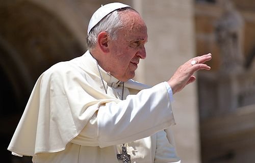Pope Francis greets pilgrims in St. Peter's Square during the Wednesday General Audience