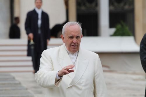 Pope Francis greets pilgrims during his March 25