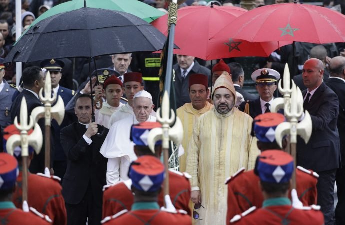 Pope Francis is flanked by Moroccan King Mohammed VI