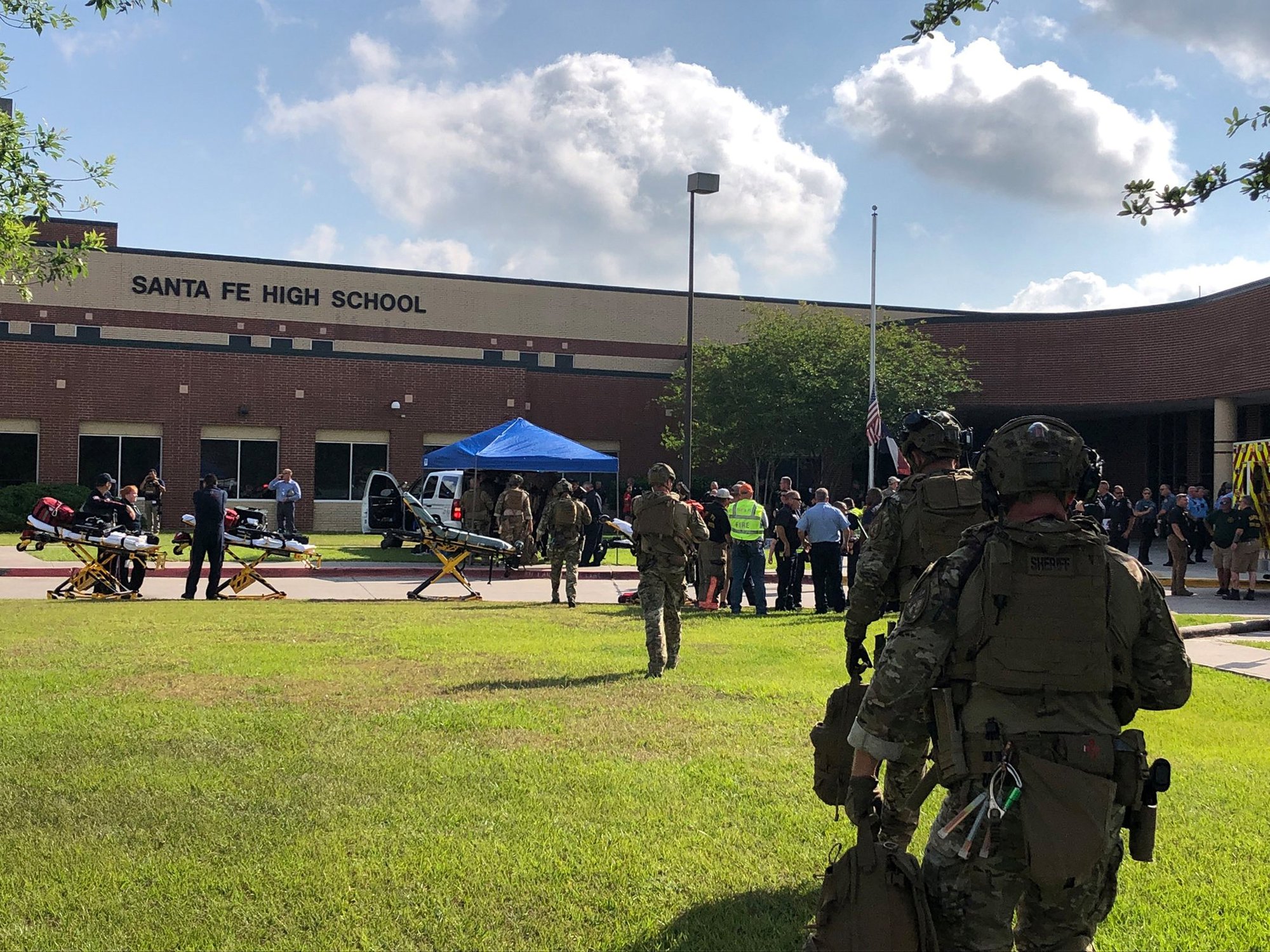 Law enforcement responds to a mass shooting May 18 at Santa Fe High School in Santa Fe