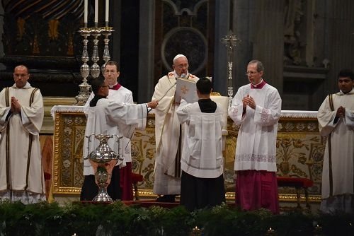 Pope Francis blesses sacred oils during the Chrism Mass at St. Peter's Basilica on April 17