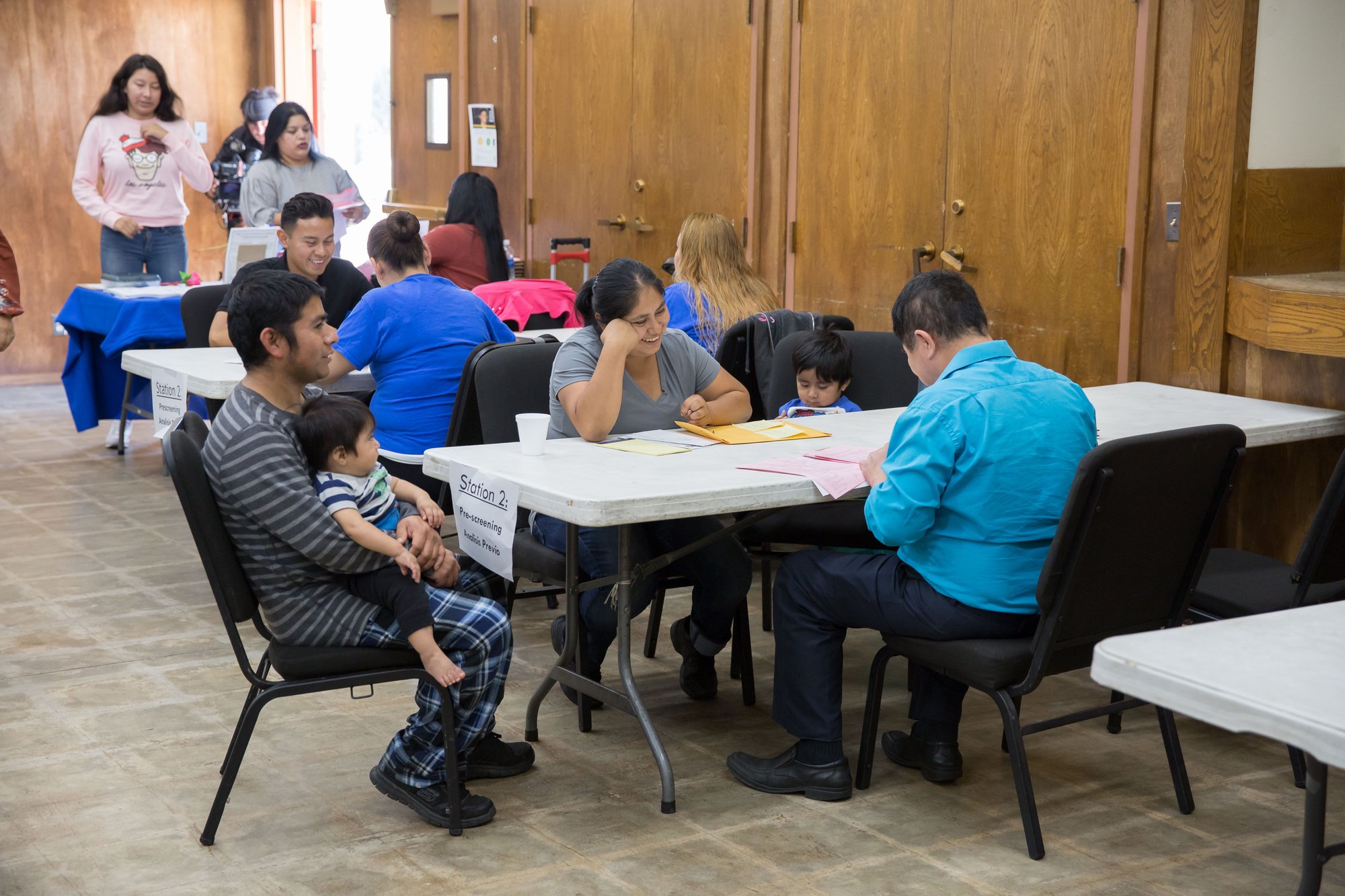 A family participates in a DACA renewal workshop Sept. 27 at Resurrection Parish in Boyle Heights. (Photo credit: Dima Otvertchenko)