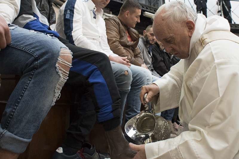 Pope Francis washes inmates' feet at Rome's Regina Coeli Prison during the celebration of the Mass of the Lord’s Supper on Holy Thursday
