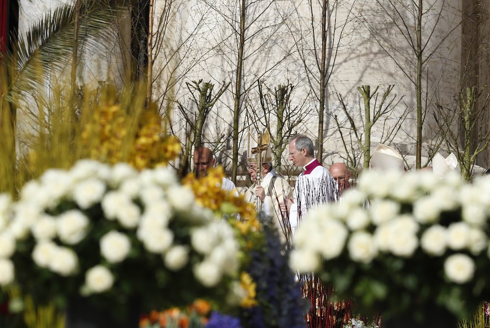 Pope Francis arrives to celebrate Easter Mass in St. Peter's Square at the Vatican April 1. (CNS file photo/Paul Haring)