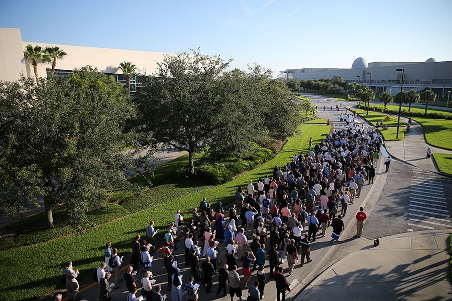 People walk in a eucharistic procession during the "Convocation of Catholic Leaders: The Joy of the Gospel in America" July 3 in Orlando