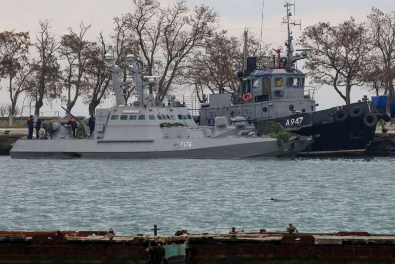 Seized Ukrainian military vessels are seen in a port of Kerch