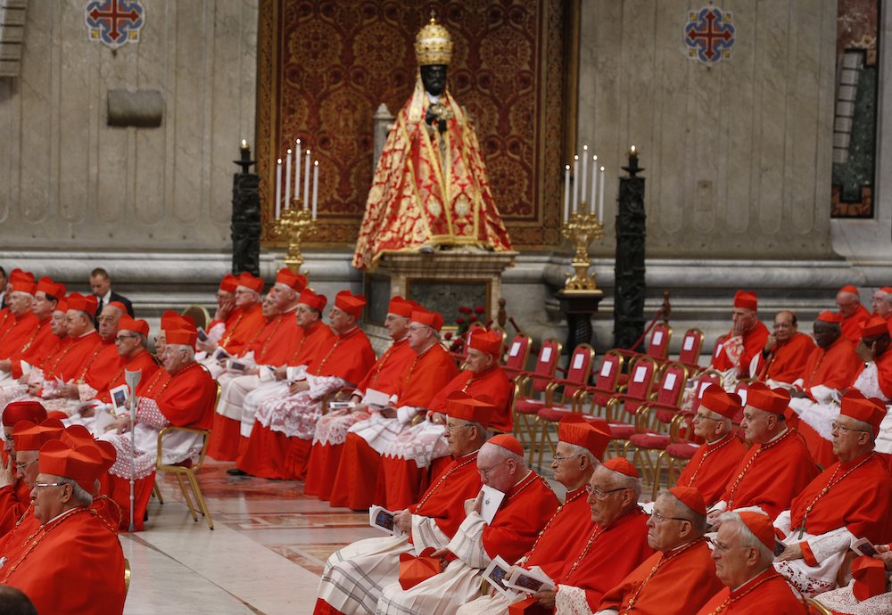Cardinals attend a consistory led by Pope Francis to create new cardinals in St. Peter's Basilica at the Vatican in this June 28