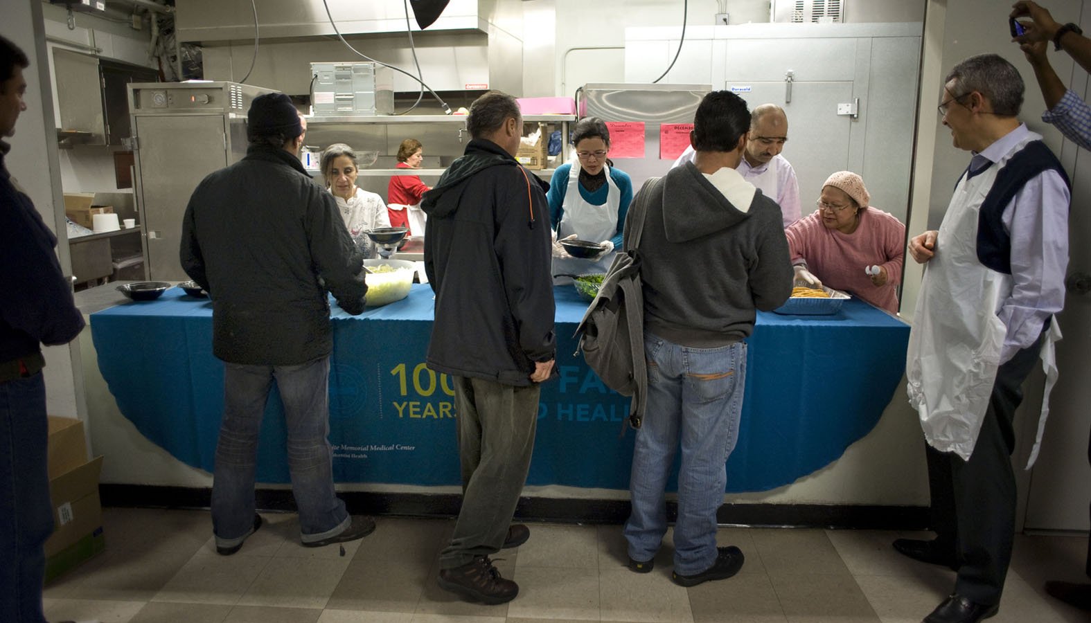Men are served dinner at the Guadalupanos Homeless Project, a shelter for homeless men and women run by Dolores Mission Catholic Church in Los Angeles. (David Maung/Catholic News Service)