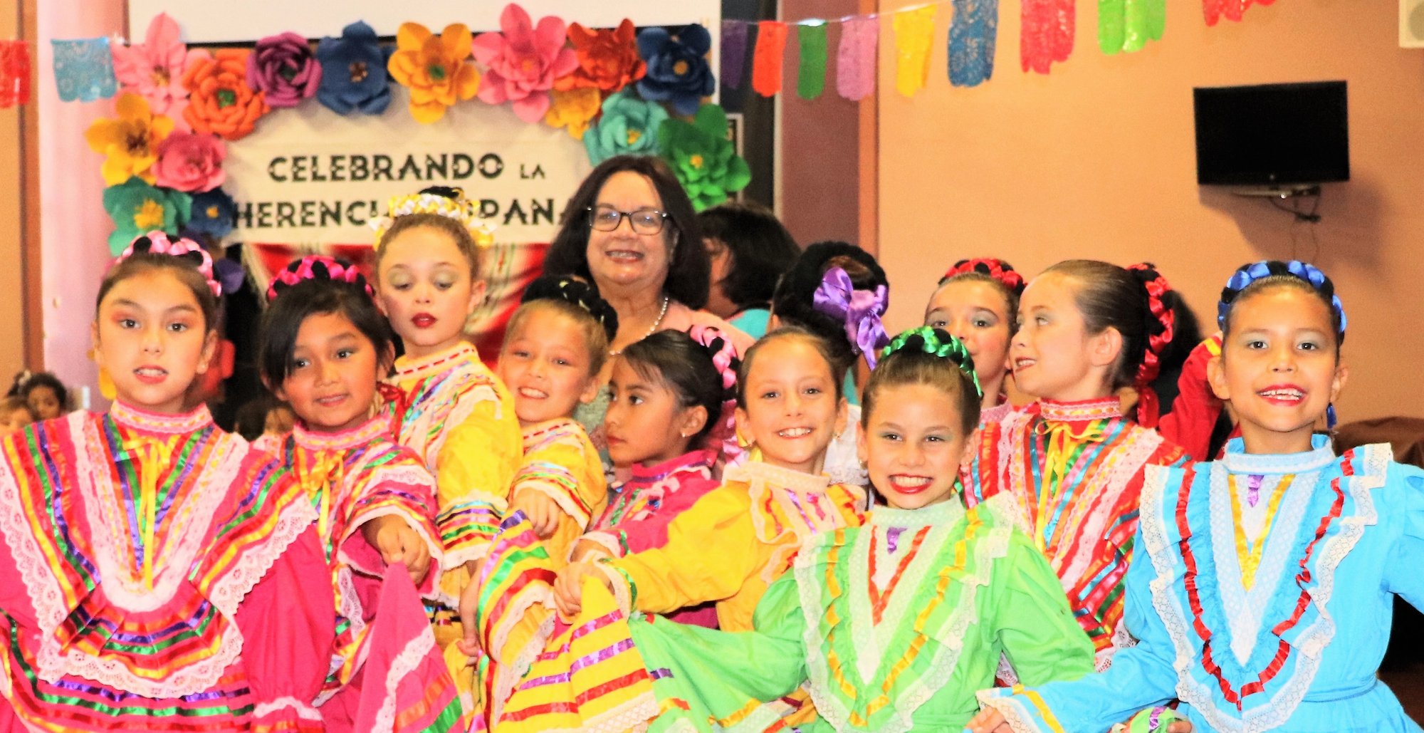 Mayor Adele Andrade-Stadler poses with third grade dancers from All Souls Catholic School in Alhambra at the school's annual Hispanic Heritage Month celebration on Oct. 3, 2019. (COURTESY ALL SOULS CATHOLIC SCHOOL)