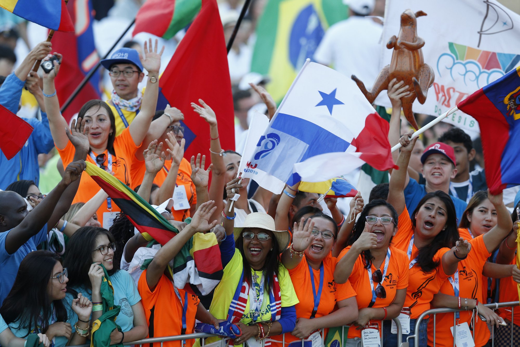 Pilgrims cheer before Pope Francis' celebration of Mass for World Youth Day pilgrims at St. John Paul II Field in Panama City Jan. 27, 2019. (CNS/Paul Haring)