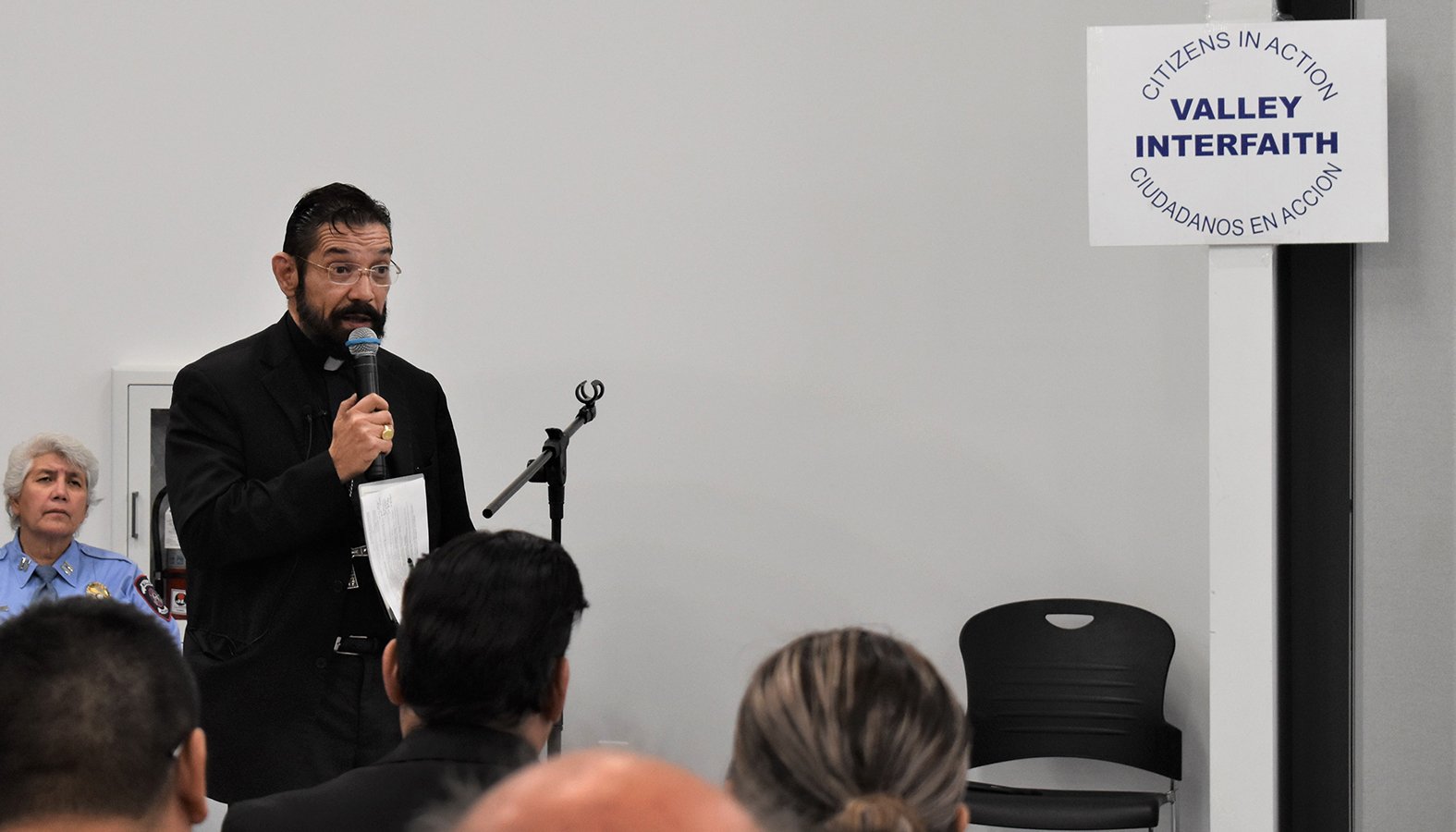 Bishop Daniel E. Flores of of Brownsville, Texas, addresses a crowd of nearly 500 people gathered Sept. 24, 2019, in Las Milpas to help introduce the "parish identification strategy." The program provides photo ID cards to parishioners issued by individual parishes or organizations that local law enforcement and city officials said they will accept as valid identification. The cards cannot be used as a driver's license or in place of a government ID. (CNS photo/Paul Binz, The Valley Catholic)
