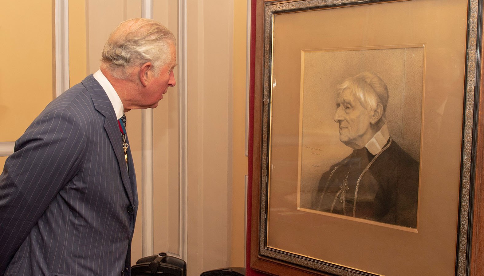 Britain's Prince Charles visits an exhibition of Cardinal Newman's life and work at the Venerable English College in Rome Oct. 13, 2019, the day of the canonization of St. John Henry Newman and four others. (CNS photo/Arthur Edwards, pool via Reuters)
