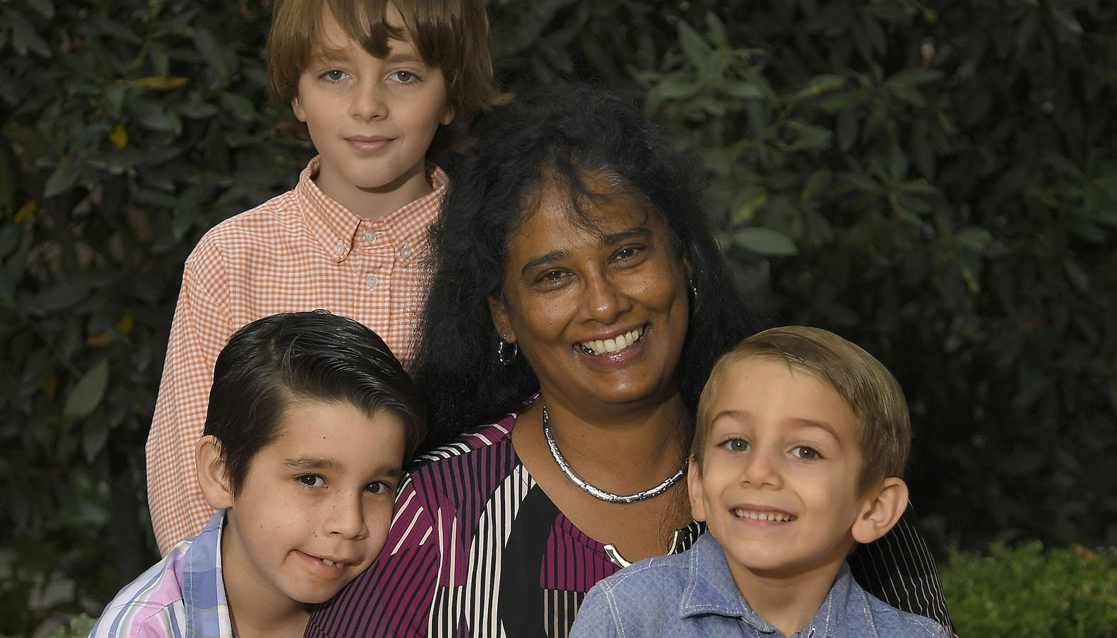 Marie Dharmaratne with her children Malachi James,12, Christian Dharmaratne,10, and Liam Dharmaratne,5, on November 8, 2018 in Pasadena, California. (Photo by John McCoy/Angelus News)