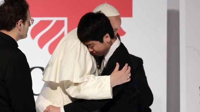 Pope Francis hugs Matsuki Kamoshita as he meets with victims of the March 11, 2011 Fukushima nuclear plant disaster in northern Japan Monday, Nov. 25, 2019, in Tokyo, Japan. (Jae Hong/AP via Crux)