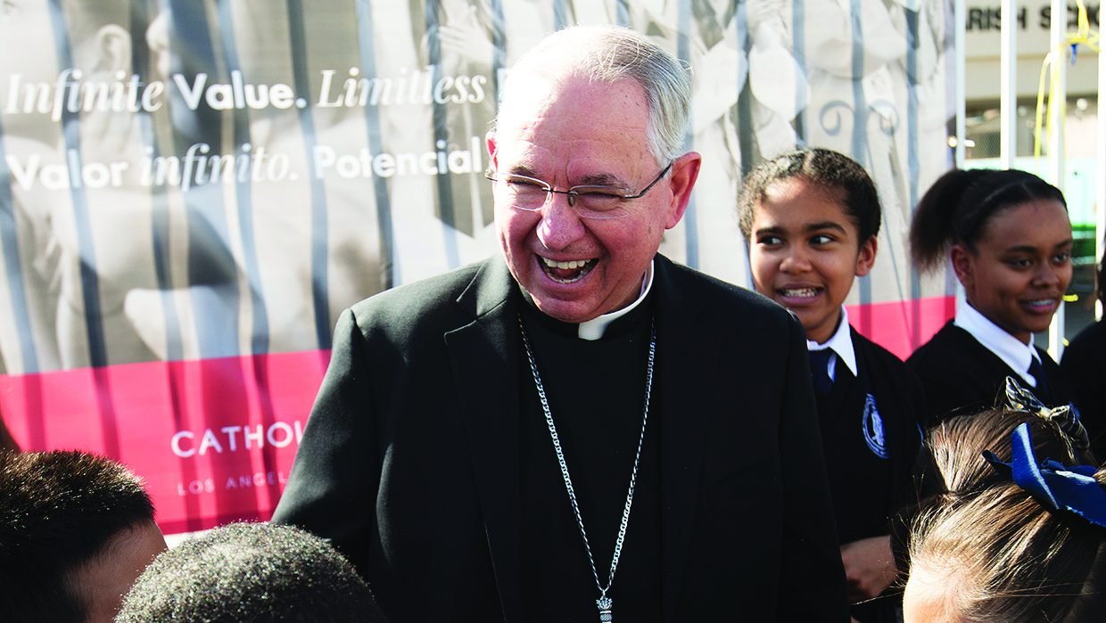 Archbishop José H. Gomez shares a laugh with students at St. Paul Dual Language Academy in Mid City Los Angeles on Jan. 29, 2018. (Victor Alemán)