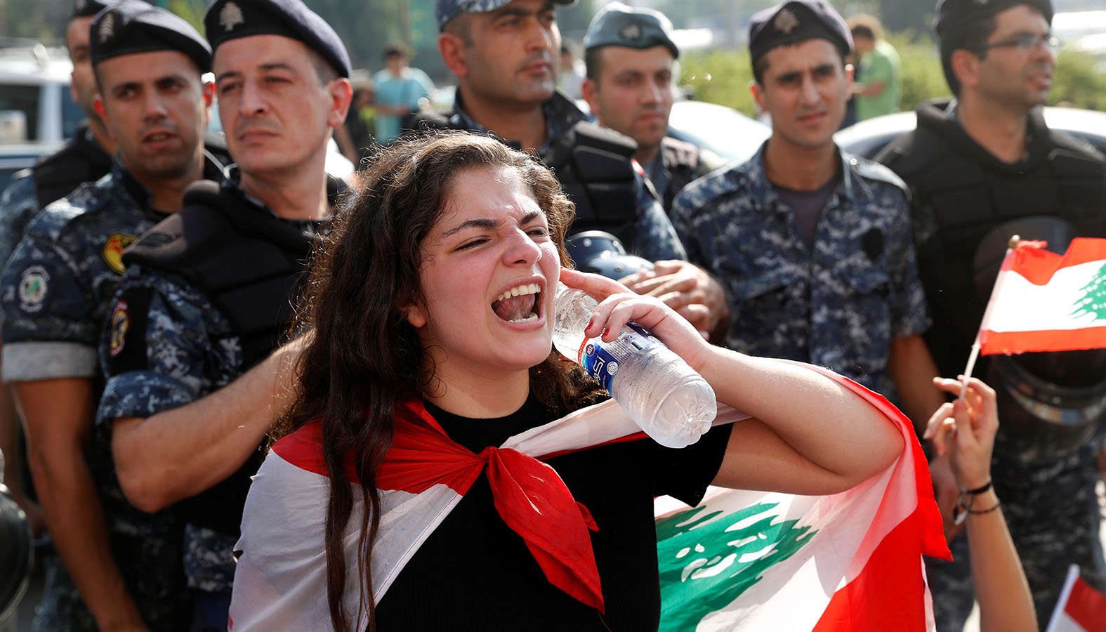 A woman shouts during an anti-government protest in Beirut Nov. 5, 2019. Hundreds of thousands of Lebanese are hitting the streets across the country to demand an end to rampant corruption and poor public services. (CNS photo/Goran Tomasevic, Reuters)