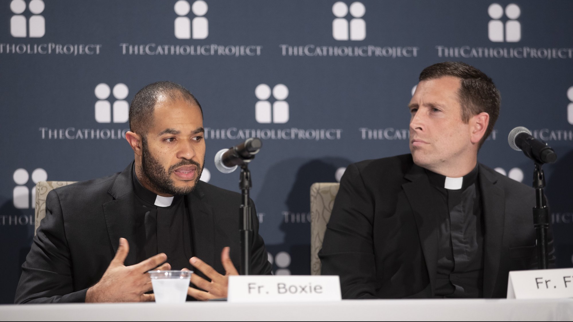 Fathers Robert Boxie III, parochial vicar at St. Joseph Parish in Largo, Md., and Matthew Fish, administrator of Holy Family Church and School in Hillcrest Heights, Md., speak on a panel titled "Shepherds to a Wounded Flock: How our Priests See the Crisis," at The Catholic University of America in Washington Oct. 29, 2019. (CNS photo/Andrew Rozario, Catholic Standard)