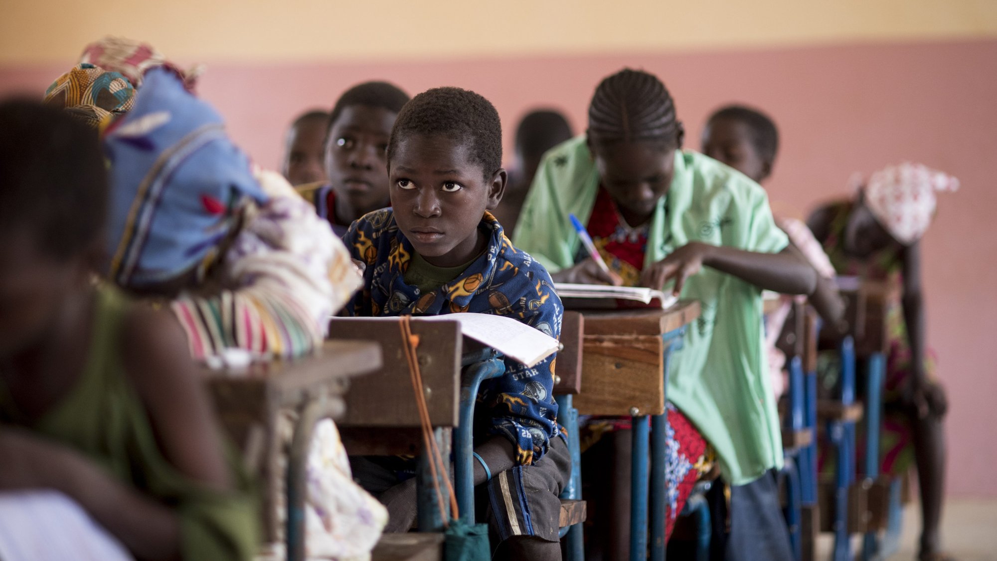 Students at Diarrabougou School work in a classroom in Mali. The students will receive a free school lunch each day through Catholic Relief Services' Jigiya program, also known as Food for Education. The bishops of five West African nations committed to a renewed effort to seek peace in the Sahel region as growing violence has disrupted daily life and uprooted entire communities. (CNS photo/Michael Stulman, CRS)
