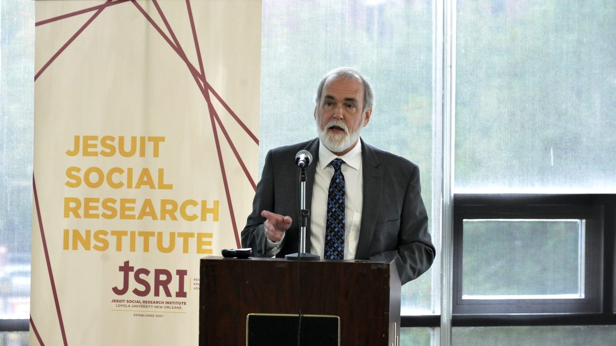 Dennis Kalob, economic policy specialist of the Jesuit Social Research Institute of Loyola University New Orleans, speaks during a Nov. 21, 2019, news conference. Kalob said the five states of the Gulf South rank near the bottom of the "JustSouth Index" measuring poverty, racial disparity and immigrant exclusion. The report calls for raising the federal minimum wage and increasing access to health care. (CNS photo/Peter Finney Jr., Clarion Herald)