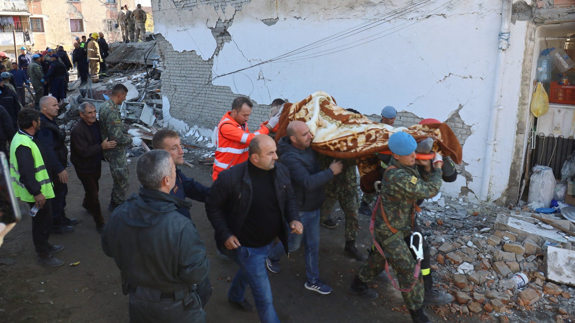 Military and emergency personnel carry an injured man following a magnitude 6.4 earthquake in Thumane, Albania, Nov. 26, 2019. "I would like to send my greetings and my closeness to the dear people of Albania who have suffered so much in these days," Pope Francis said Nov. 27 before concluding his weekly general audience at the Vatican. (CNS photo/Florion Goga, Reuters)