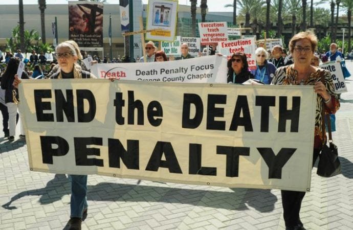 Demonstrators march to protest the death penalty during a rally organized by Catholics Against the Death Penalty-Southern California in Anaheim Feb. 25, 2017. Most Americans support life imprisonment over the death penalty, according to a Gallup poll released Nov. 24, 2019, revealing a shift in the majority opinion on this issue for the first time in 34 years. (Andrew Cullen/Reuters via CNS)