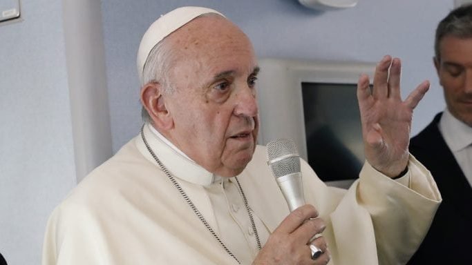 Pope Francis speaks during a news conference onboard the papal plane on his flight back from a trip to Thailand and Japan, Monday, Nov. 26, 2019. (Remo Casilli/Pool Photo/AP via Crux)