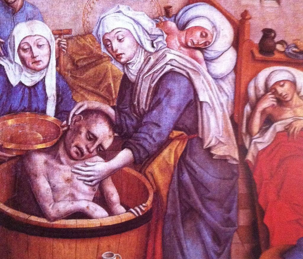 St Elizabeth washing a beggar, a scene from the main altar of St Elizabeth Cathedral in Košice, Slovakia. (Wikimedia Commons)