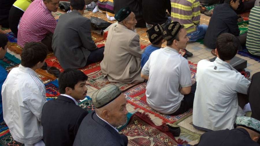 Uyghurs at a mosque in Kashgar, Xinjiang, China, September 2010. (Preston Rhea/Flickr (CC BY-SA 2.0) via CNA)