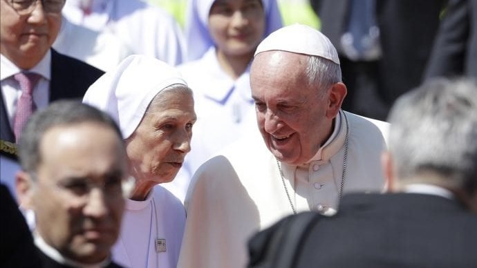 Pope Francis talks to his cousin Ana Rosa Sivori as he arrives at Military Air Terminal of Don Muang Airport, Wednesday, Nov. 20, 2019, in Bangkok, Thailand. (Gregorio Borgia/AP via Crux)