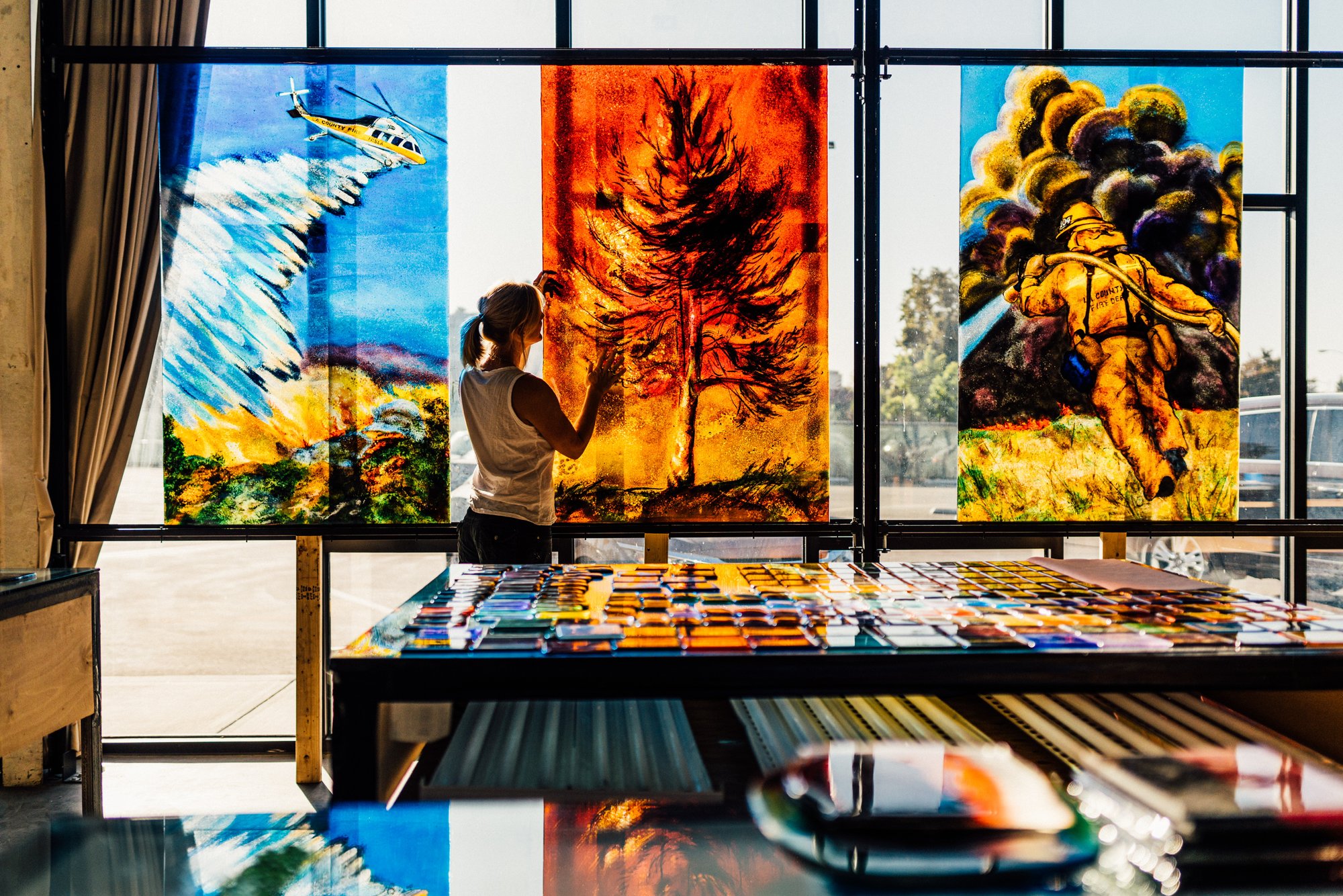 Anne-Elizabeth Sobieski works on the three main panels. (Robiee Ziegler)