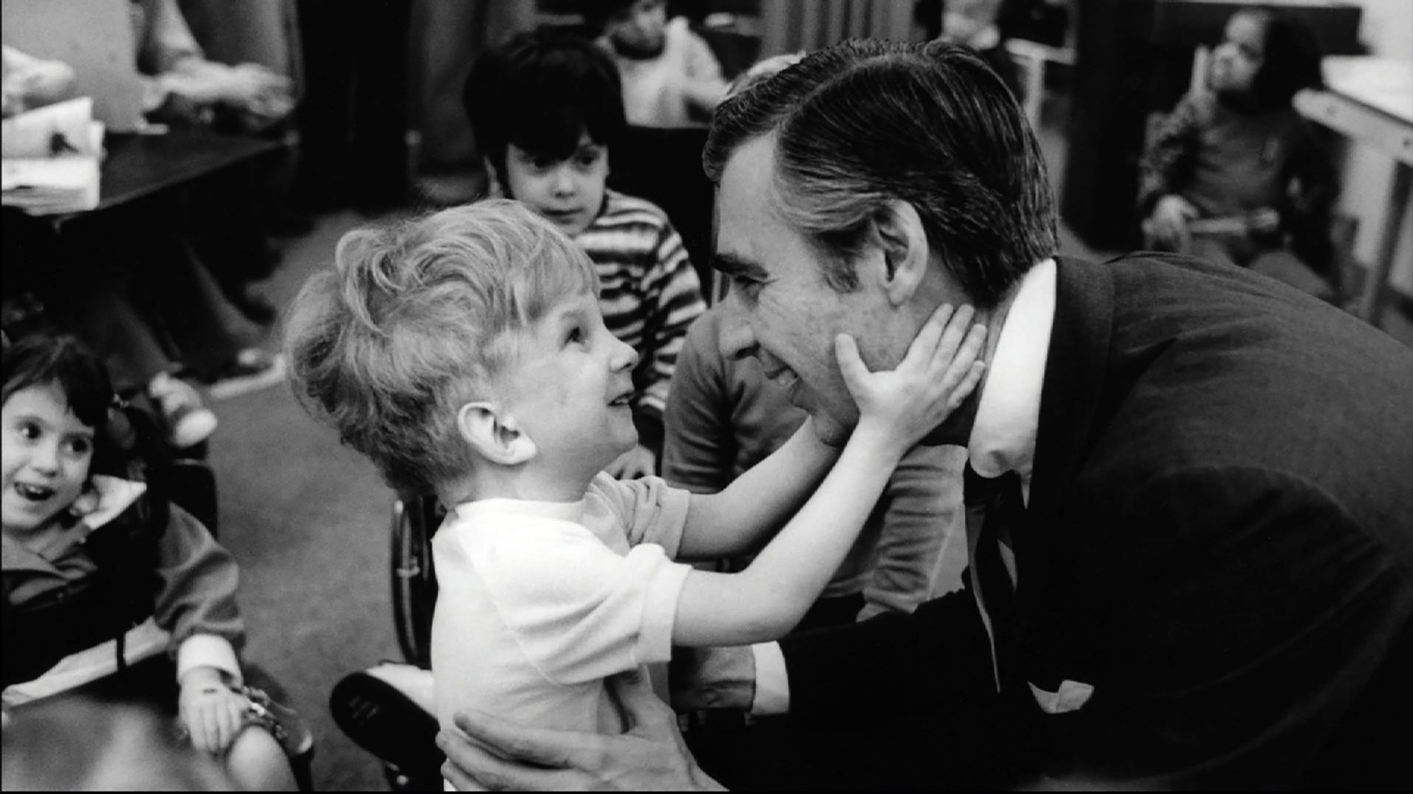 Fred Rogers visits with children in a scene from the documentary “Won’t You Be My Neighbor?” (CNS photo/Jim Judkis, Focus Features)