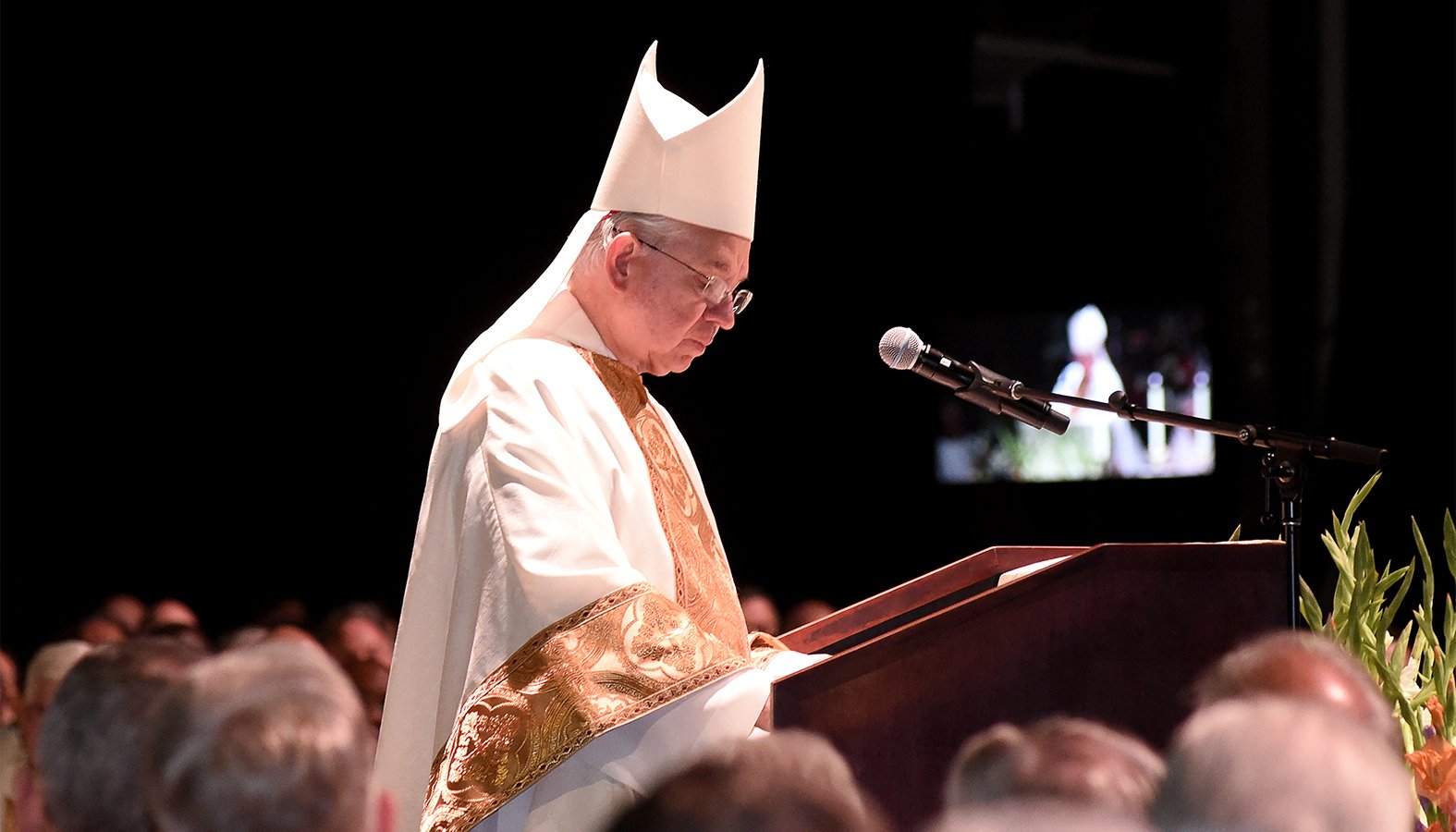 Los Angeles Archbishop Jose H. Gomez, who is president of the U.S. Conference of Catholic Bishops, delivers the homily Dec. 2, 2019, at Comerica Theatre in Phoenix during a Mass commemorating the 50th anniversary of the Phoenix Diocese. (CNS photo/Jesus Valencia, The Catholic Sun )