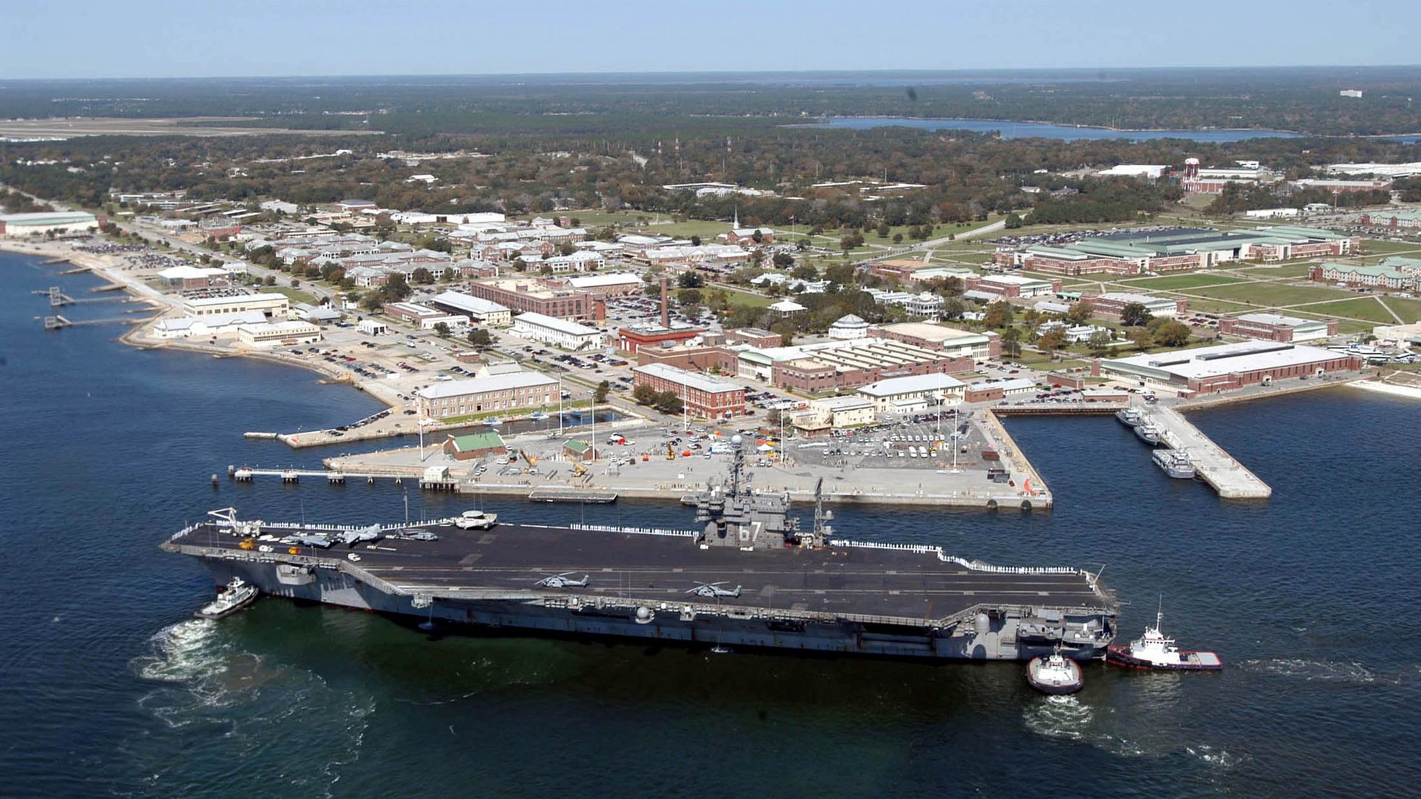 The aircraft carrier USS John F. Kennedy arrives for exercises at Naval Air Station Pensacola, Fla., March 17, 2004. Three people were shot dead early Dec. 6, 2019, at the airbase and the gunman was a trainee with the Saudi Air Force, Florida Gov. Ron DeSantis said. (CNS photo/Patrick Nichols, U.S. Navy handout via Reuters)