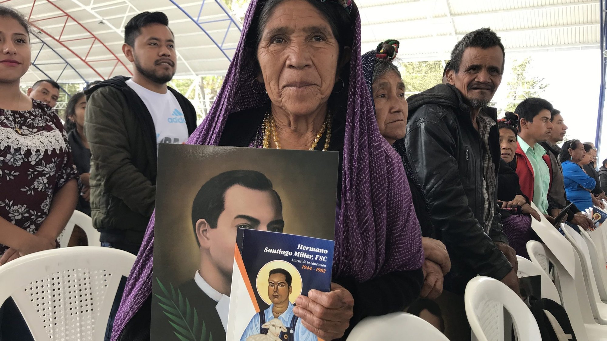 A woman attends the the Dec. 7, 2019, beatification Mass of Blessed James Miller in Huehuetenango, Guatemala. (CNS photo/CNS photo/David Agren )