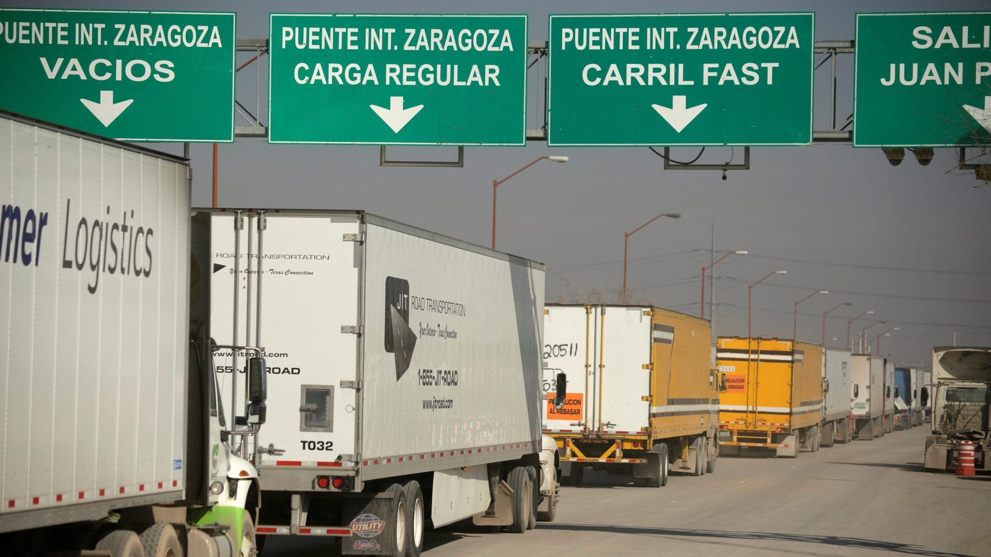 Trucks wait in line for border customs control, to cross into the U.S., at the Zaragoza-Ysleta border crossing bridge in Ciudad Juarez, Mexico, Dec. 12, 2019. The United States, Mexico and Canada called the United States-Mexico-Canada Agreement, or USMCA. It was signed by the three countries last year but underwent revisions. Now the U.S. House and Senate must approve it and then it will go to President Donald Trump for his signature. Mexico ratified the agreement in June, and Canada is expected to do so soon. (CNS photo/Jose Luis Gonzalez, Reuters)