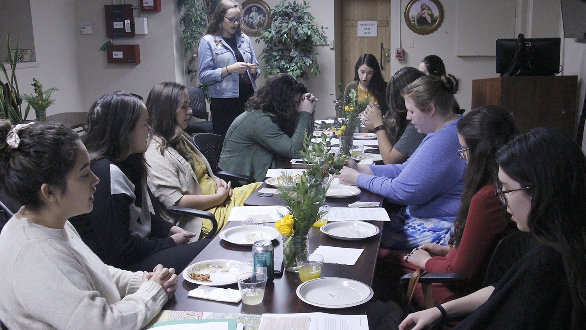 Women pray a decade of the rosary for Aid to Women Center clients as part of Mary's Baby Shower activities at Mary College in Tempe, Ariz., Dec. 7, 2019. Six official Mary's Baby Shower events were listed online, and 100 people downloaded a free party pack from the site within an hour of the pack's release in November. (CNS photo/Ambria Hammel, Catholic Sun)