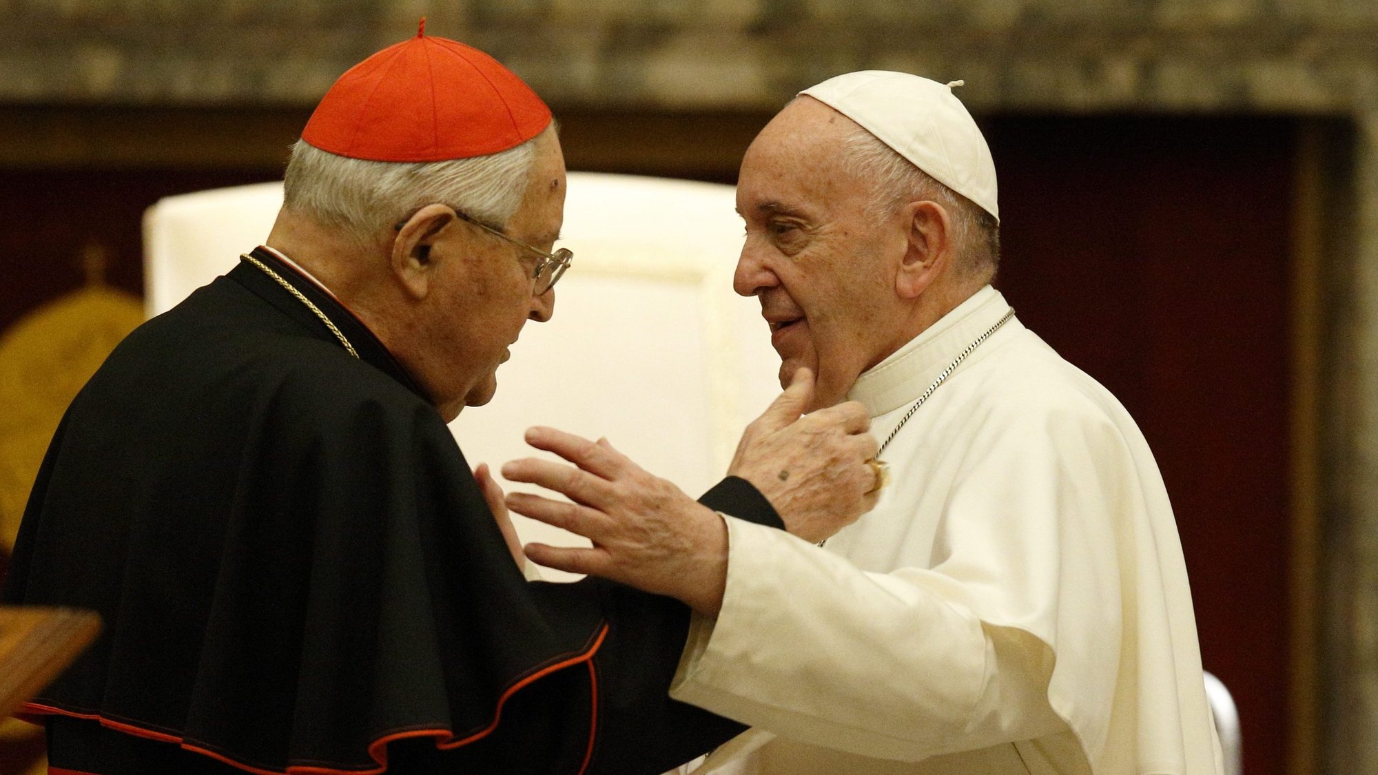 Pope Francis greets Cardinal Angelo Sodano, now dean emeritus of the College of Cardinals, during his annual audience to give Christmas greetings to members of the Roman Curia at the Vatican Dec. 21, 2019. The pope has accepted the resignation of Cardinal Sodano as dean of the College of Cardinals. The pope changed the norms to specify that the dean would be elected to a five-year term, renewable once, instead of being elected for life or until choosing to resign. (CNS photo/Paul Haring)