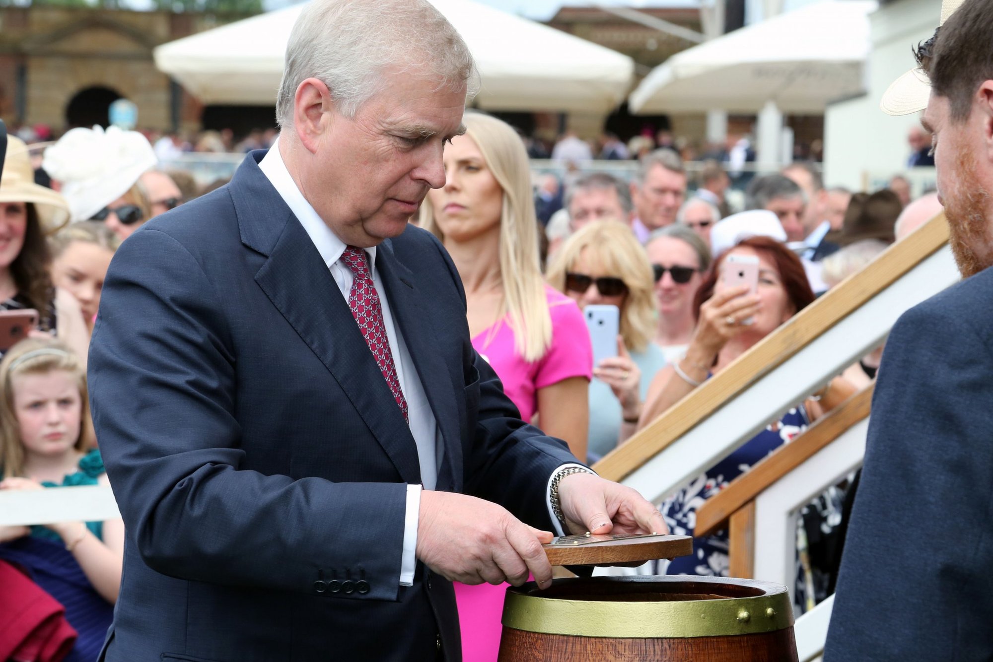 Prince Andrew assists in the burying of a time capsule to mark the Diamond Jubilee of the John Smiths Cup at York Racecourse in the United Kingdom July 13. (Mick Atkins/Shutterstock)