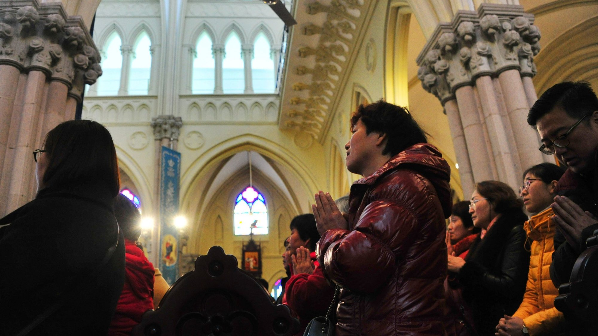 People pray during Mass at St. Ignatius Cathedral in Shanghai Dec. 16, 2017. (CNS photo/Zhong Yang, Reuters)