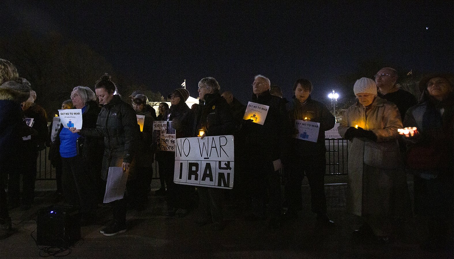 People gathered Jan. 6, 2020 near the White House in Washington during a candlelight vigil to call for peaceful solutions to rising tensions between the United States and Iran. (CNS photo/Tyler Orsburn)